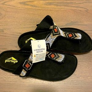 Never been worn before, with the tag still attached sandals.